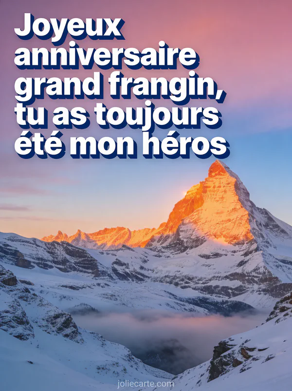 Montagnes enneigées majestueuses au lever du soleil avec lumière rose orangée sur les sommets et vallée de brume