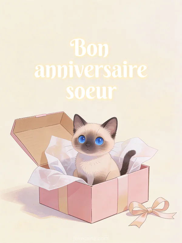 Chaton siamois aux yeux bleus assis dans une boîte cadeau rose ouverte avec papier de soie et nœud