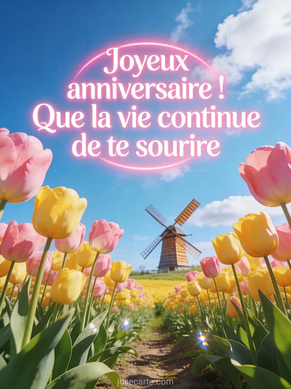 Champ de tulipes roses et jaunes sous un ciel bleu avec moulin à vent au loin souhaiter anniversaire belle-fille