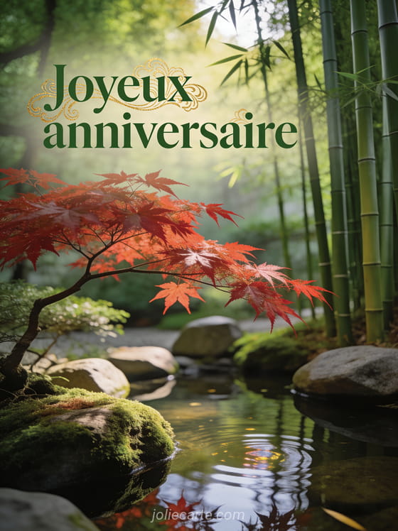 Jardin japonais zen avec érable rouge au bord d'un petit étang, pierres moussues et bambou dans une lumière tamisée avec le texte Joyeux anniversaire