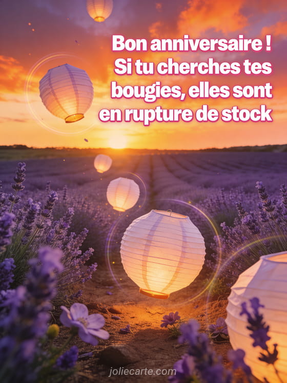 Champ de lavande en Provence sous un coucher de soleil flamboyant avec des lanternes en papier flottant dans le ciel