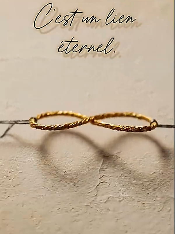 Carte animée deuil poétique avec symbole de l'infini en corde qui s'illumine progressivement sur fond clair