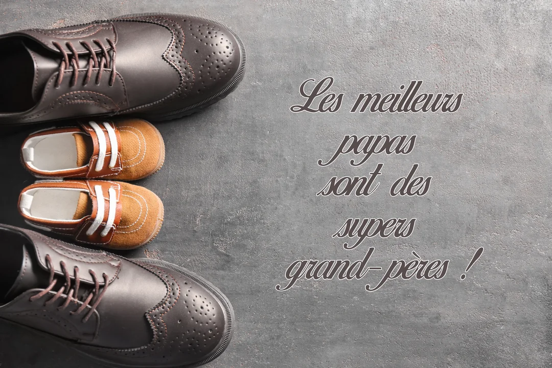 Vue de dessus de grandes chaussures d'homme en cuir marron entourant une petite paire de chaussures de bébé sur un fond gris texturé.