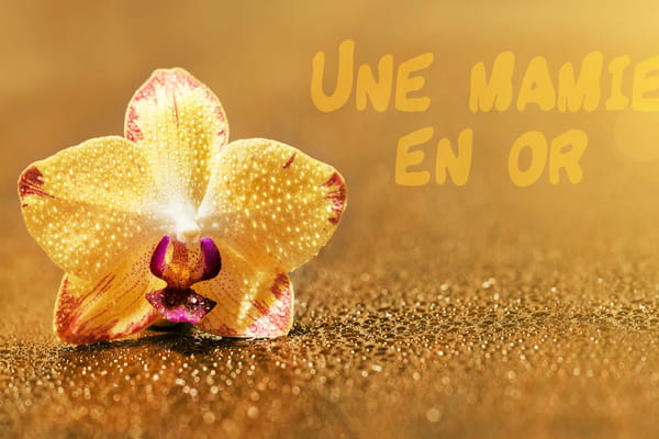 Carte pour la Fête des Grands-mères avec le texte 'Une mamie en or' sur une photo d'orchidée jaune couverte de gouttes de rosée scintillantes.