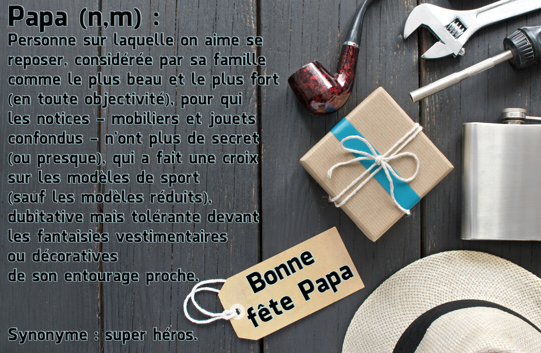 Composition d'objets masculins sur un fond en bois sombre, incluant un cadeau, des outils, une pipe, une flasque et une définition humoristique de 'Papa'.
