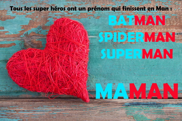 Carte pour la Fête des Mères avec un jeu de mots amusant comparant Maman aux super-héros. Un cœur rouge en ficelle est posé sur un fond en bois.