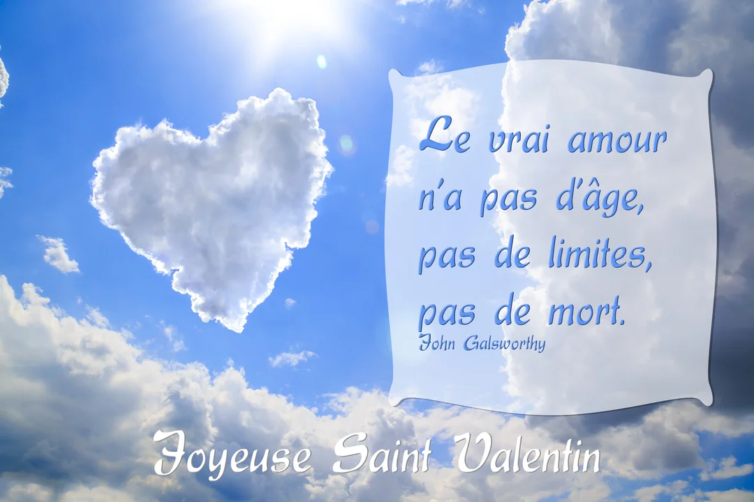 Un ciel bleu ensoleillé où flotte un nuage en forme de cœur, avec une citation sur l'amour intemporel et le vœu 'Joyeuse Saint Valentin'.