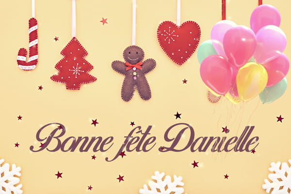 Carte de vœux pour la Sainte Danielle avec des décorations de Noël en feutrine, des ballons et le texte 'Bonne fête Danielle'.