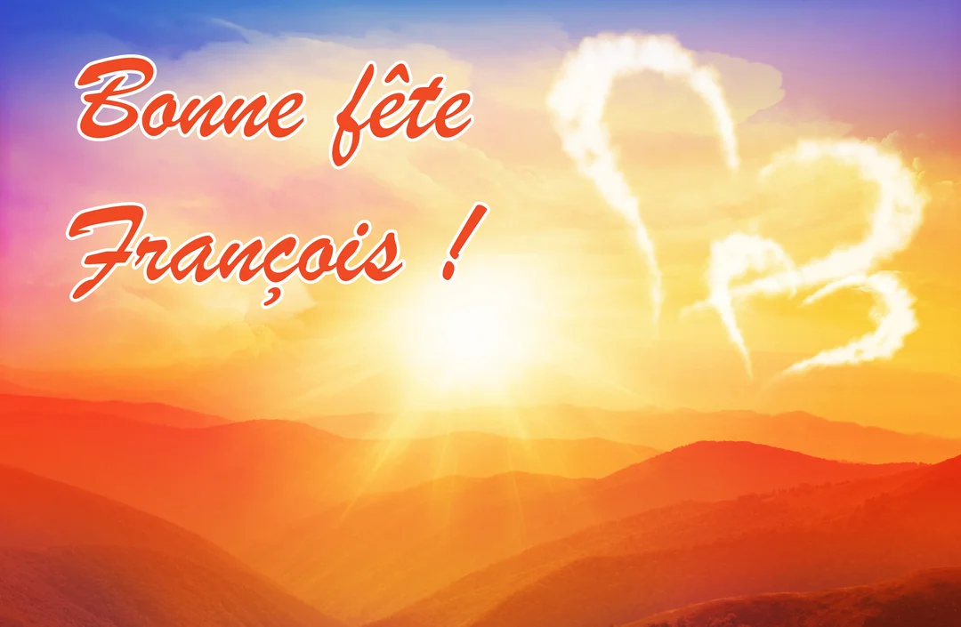 Un paysage montagneux est baigné dans la lumière d'un lever de soleil orangé, avec deux cœurs de nuages et le texte 'Bonne fête François'.