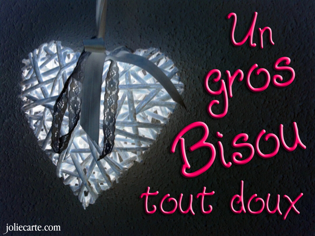Un cœur décoratif tressé et lumineux est suspendu devant un fond sombre, avec le texte affectueux 'Un gros bisou tout doux' en rose.
