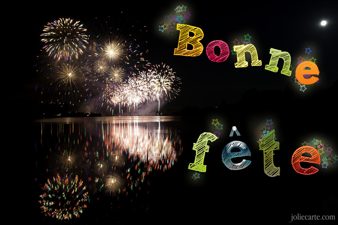 Un feu d'artifice multicolore explose dans le ciel nocturne au-dessus d'un lac, avec le texte coloré 'Bonne fête' superposé.